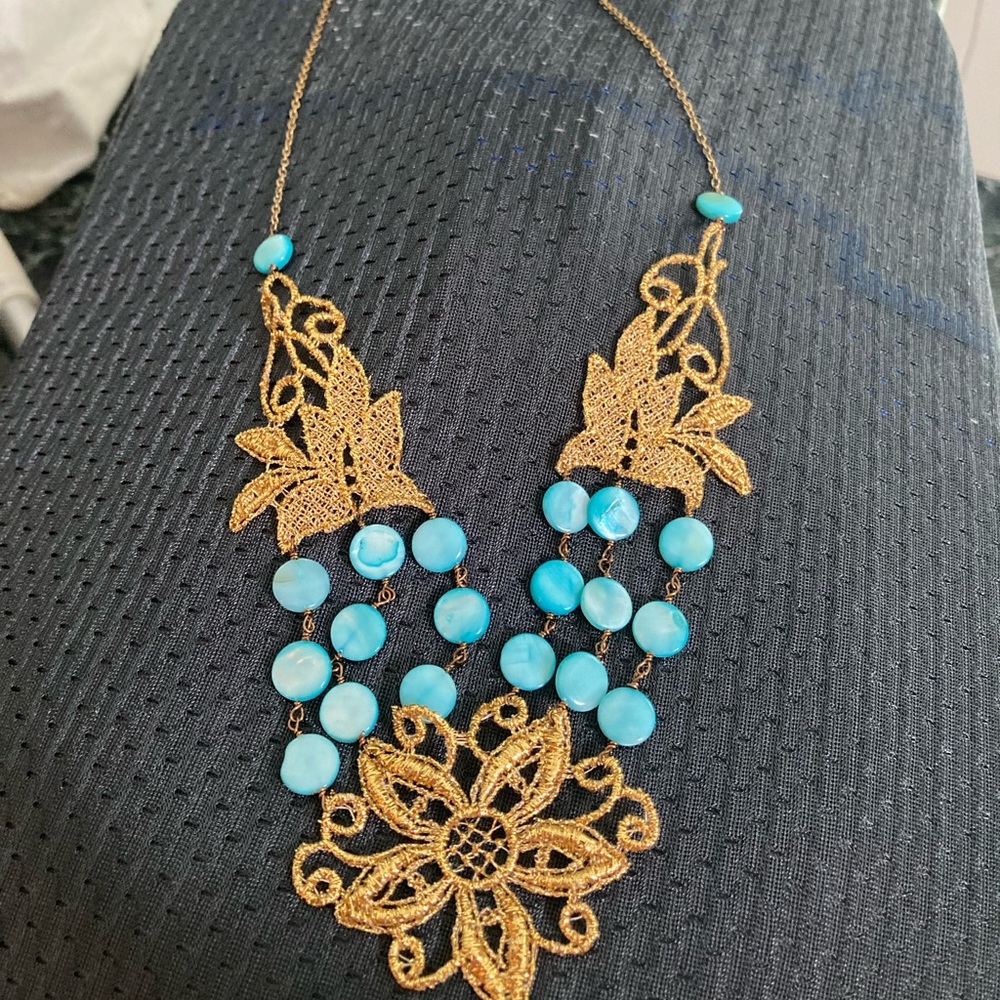Hand woven silk and turquoise bead necklace